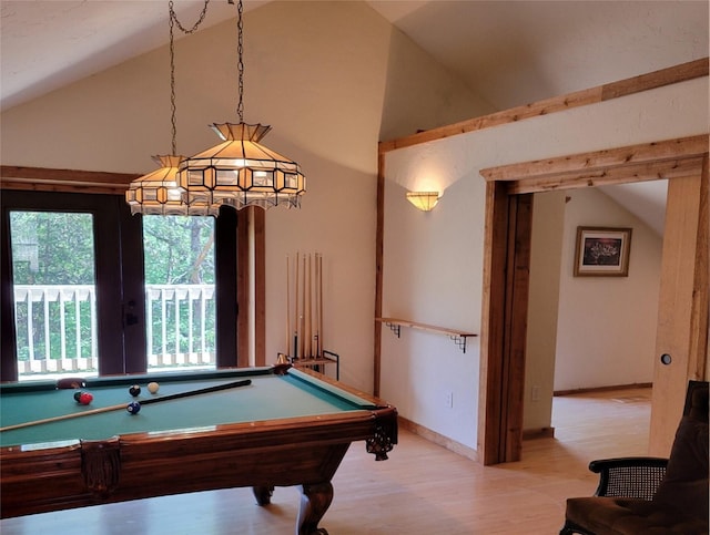 playroom with light hardwood / wood-style flooring, pool table, high vaulted ceiling, and french doors