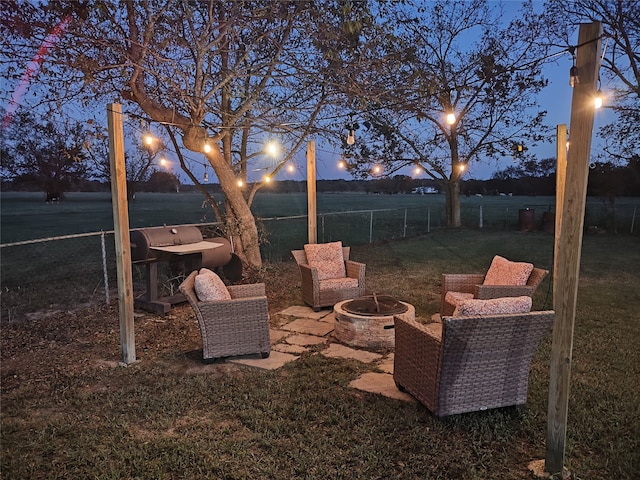 exterior space featuring an outdoor fire pit