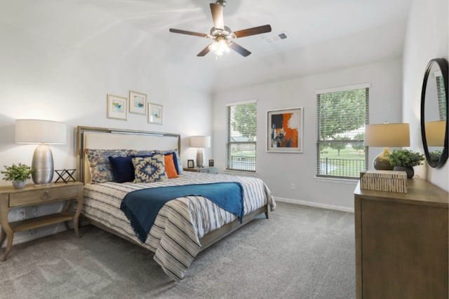 bedroom featuring ceiling fan, lofted ceiling, and carpet