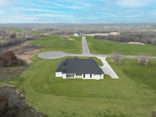 birds eye view of property featuring a rural view