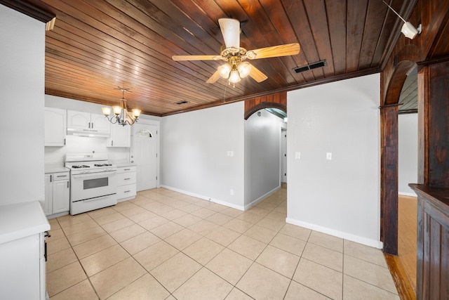 kitchen with white stove, ceiling fan with notable chandelier, wood ceiling, and white cabinets