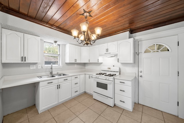 kitchen with white cabinets, wood ceiling, hanging light fixtures, sink, and white range with gas cooktop