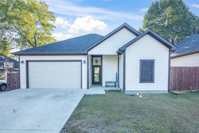 single story home featuring a front yard and a garage