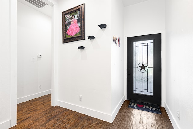 foyer entrance featuring dark hardwood / wood-style flooring