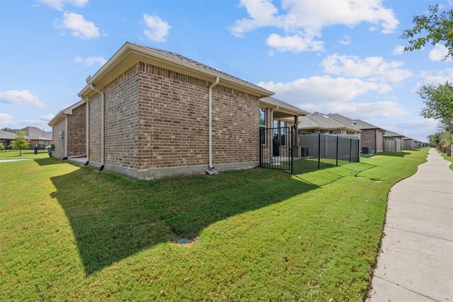 view of property exterior with a lawn