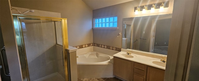 bathroom featuring vanity and separate shower and tub