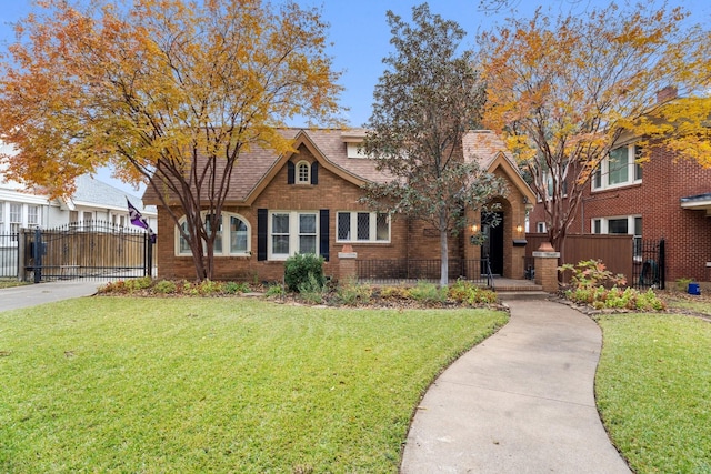 view of front of property with a front lawn