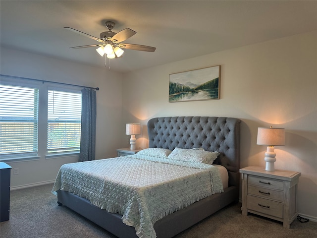 bedroom with ceiling fan and carpet floors