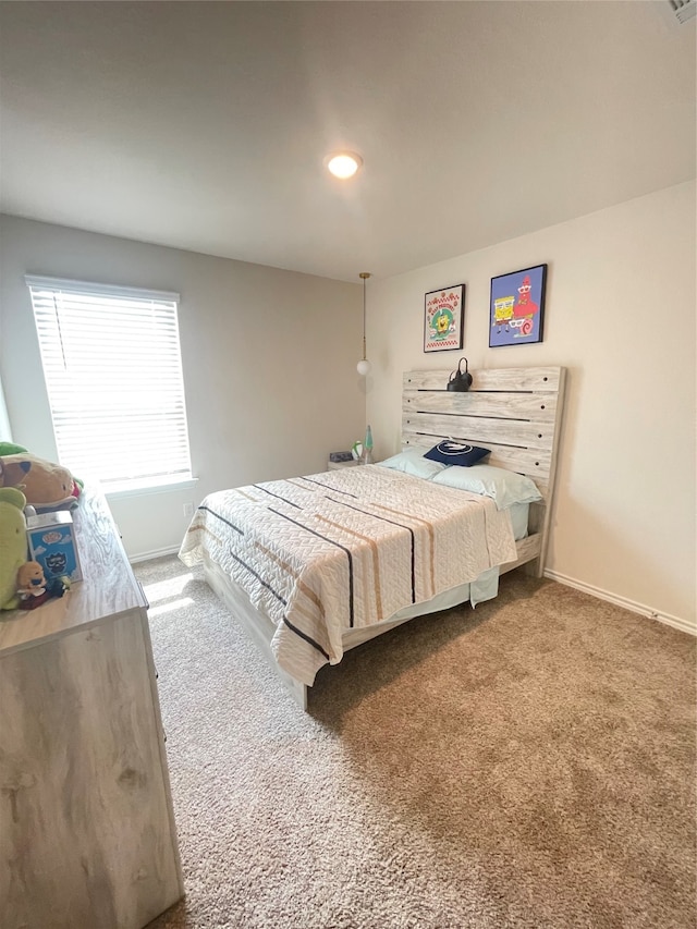 bedroom featuring carpet flooring