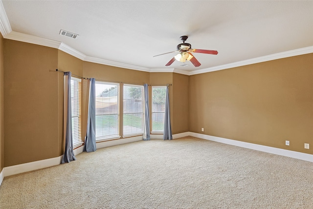 spare room with crown molding, ceiling fan, and wood-type flooring