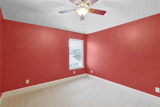 empty room with carpet and ceiling fan