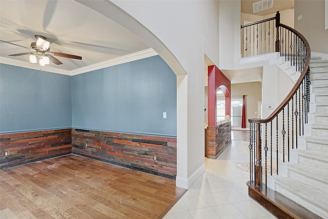 unfurnished living room with hardwood / wood-style floors and a tile fireplace