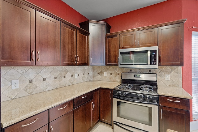 carpeted spare room with ceiling fan and ornamental molding