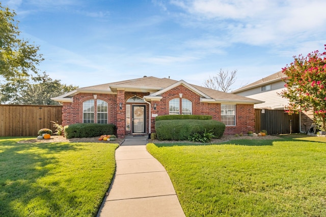 ranch-style house with a front yard