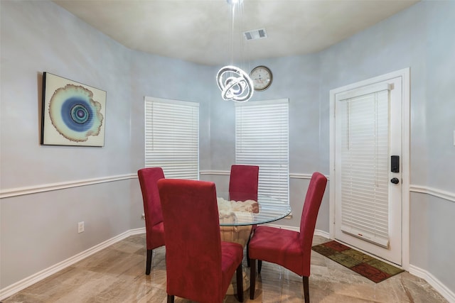 dining space featuring light hardwood / wood-style floors