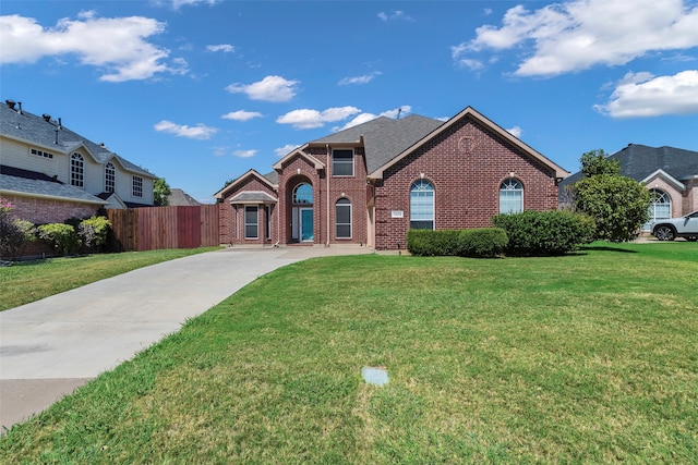 front facade with a front lawn