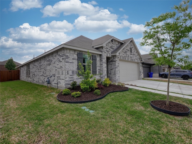 view of front of property with a garage and a front lawn