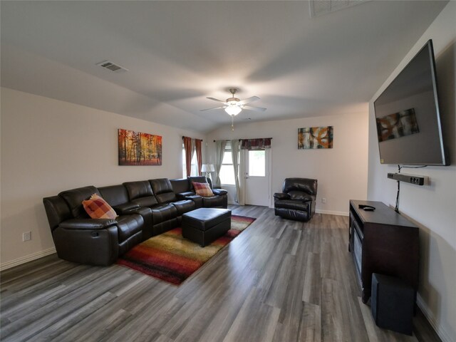 living room featuring hardwood / wood-style flooring and ceiling fan