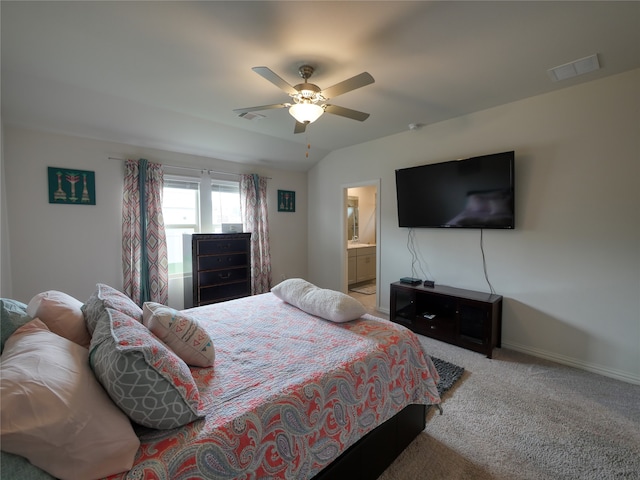 carpeted bedroom featuring ceiling fan and ensuite bathroom