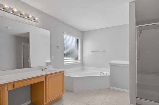 bathroom with shower with separate bathtub, tile patterned flooring, and vanity