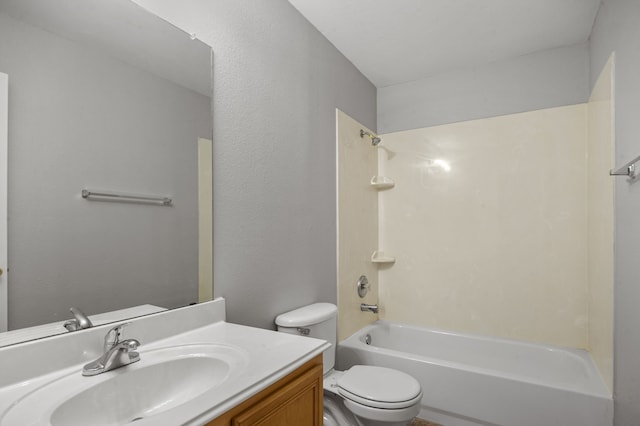 full bathroom with  shower combination, vanity, and toilet