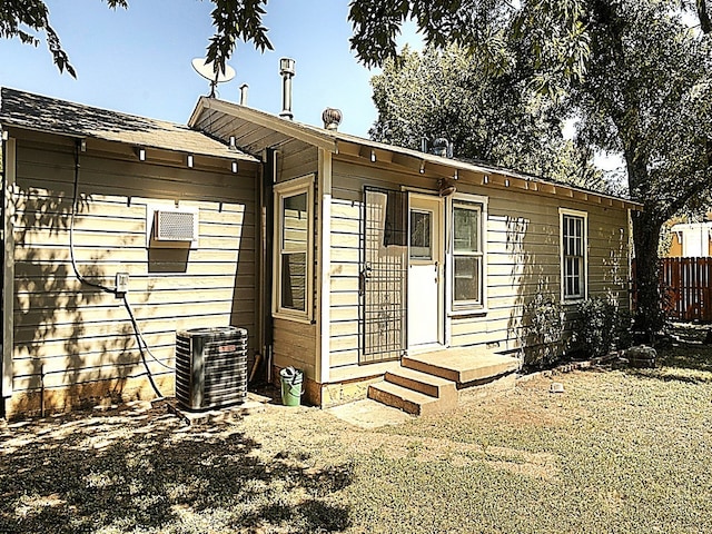 view of front of house with cooling unit