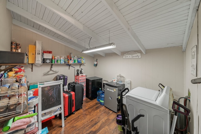 laundry room with wooden ceiling, wooden walls, and dark hardwood / wood-style flooring