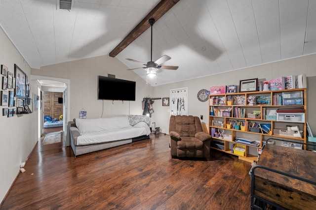 living room featuring ceiling fan, dark hardwood / wood-style floors, and lofted ceiling with beams