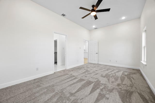 spare room with visible vents, baseboards, carpet, recessed lighting, and a ceiling fan