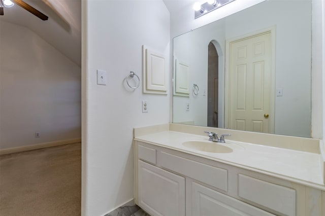 bathroom with ceiling fan and vanity