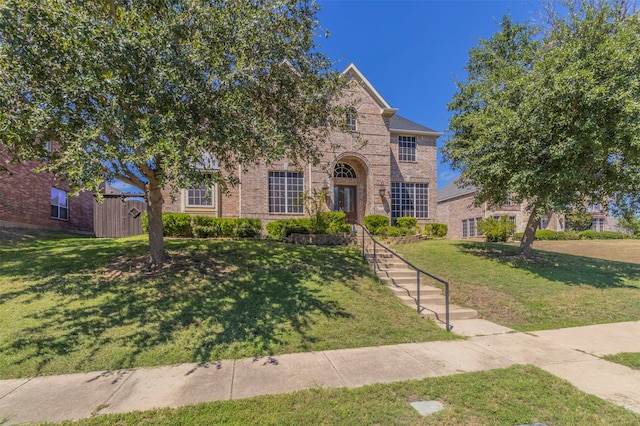 view of front facade with a front lawn