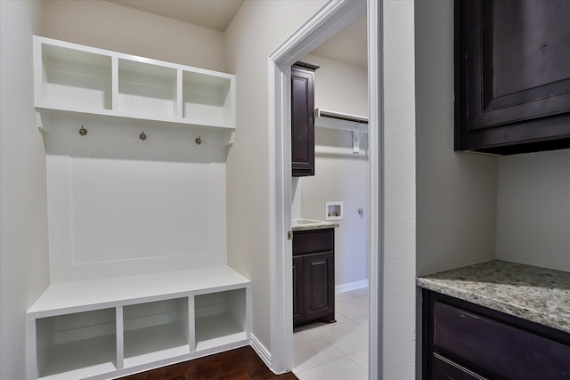 mudroom with light tile patterned flooring