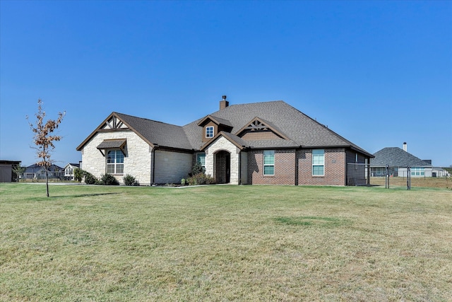 view of front of home featuring a front lawn