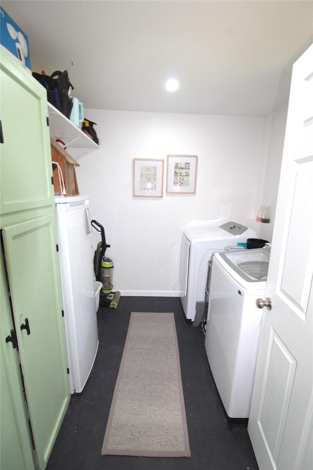 laundry room featuring washing machine and clothes dryer