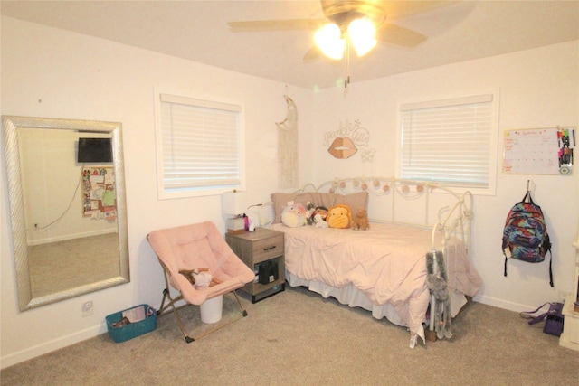 bedroom with ceiling fan and carpet flooring