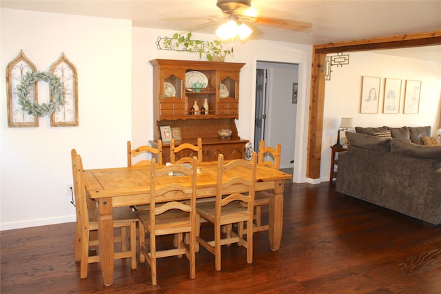 dining space featuring ceiling fan and dark hardwood / wood-style floors