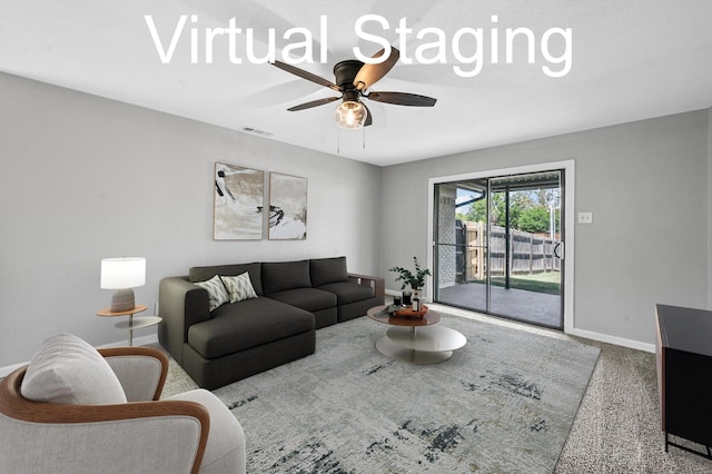 carpeted living room with ceiling fan