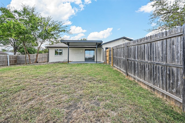 view of yard with a patio area