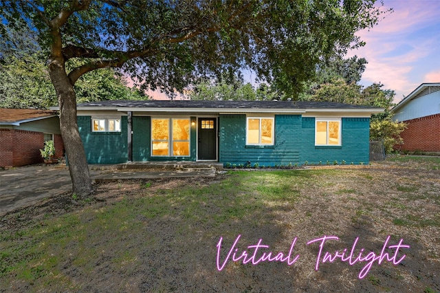 ranch-style home with a carport