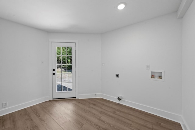 laundry room with hookup for a washing machine, hookup for an electric dryer, and light hardwood / wood-style floors