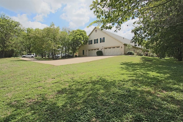 view of yard featuring a garage