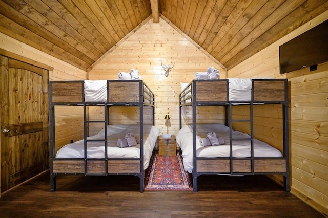 unfurnished bedroom featuring vaulted ceiling with beams, wooden walls, and dark hardwood / wood-style floors