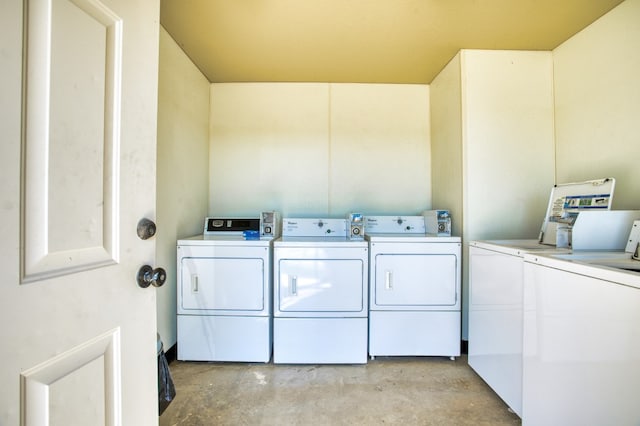 laundry area with separate washer and dryer