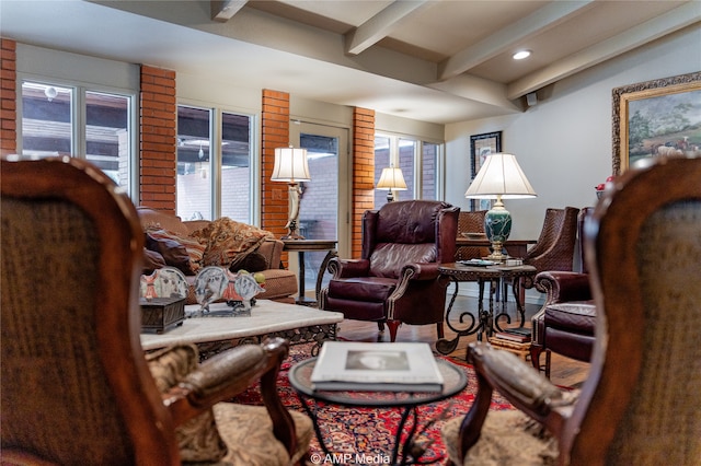 living room featuring beam ceiling