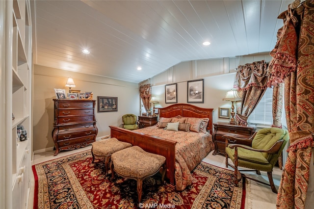 bedroom featuring lofted ceiling and wood ceiling