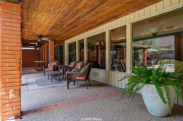 view of patio featuring ceiling fan