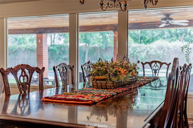 dining space featuring ceiling fan and a wealth of natural light