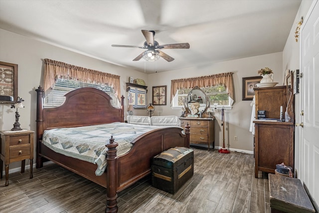 bedroom featuring dark hardwood / wood-style flooring and ceiling fan