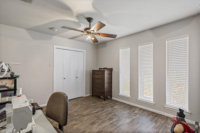 office space with ceiling fan and hardwood / wood-style floors