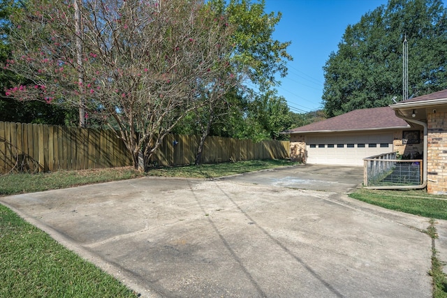 exterior space with a garage